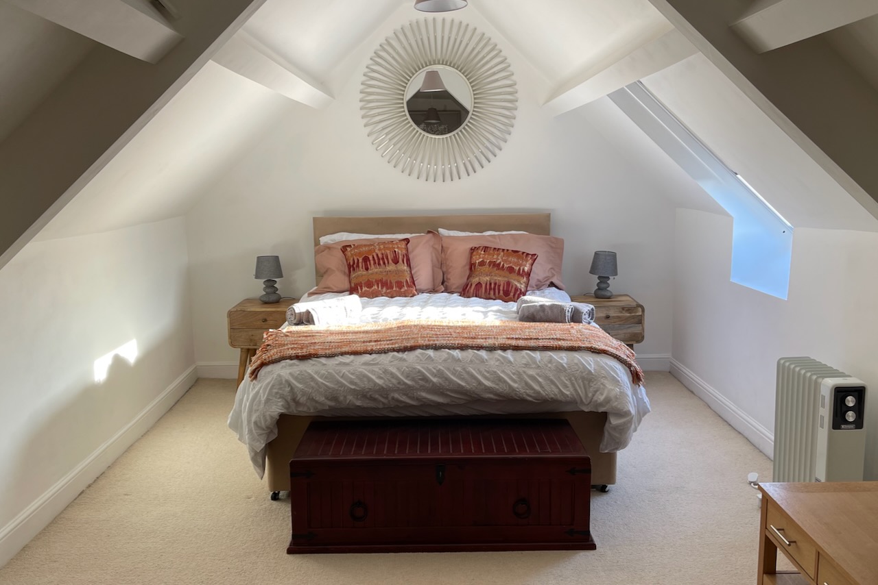Spacious master bedroom in attic